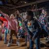 Group of Young Children Taking Part in the Smuggle Squad Activity at Museum of London Docklands